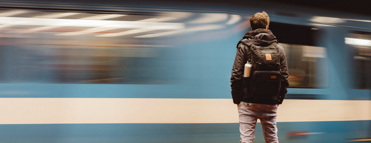 young man waiting for the subway